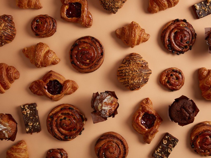 assortment-tasty-sugary-confectionery-products-variety-flavor-freshly-baked-buns-criossants-muffins-bars-chocolate-sweet-dessert-homemade-yummy-snack-baked-goods-flat-lay-1.jpg
