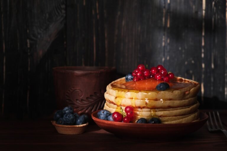 sweet-pancakes-blueberry-redcurrant-topping-homemade-pancakes-with-berries-coconut-flakes-1.jpg
